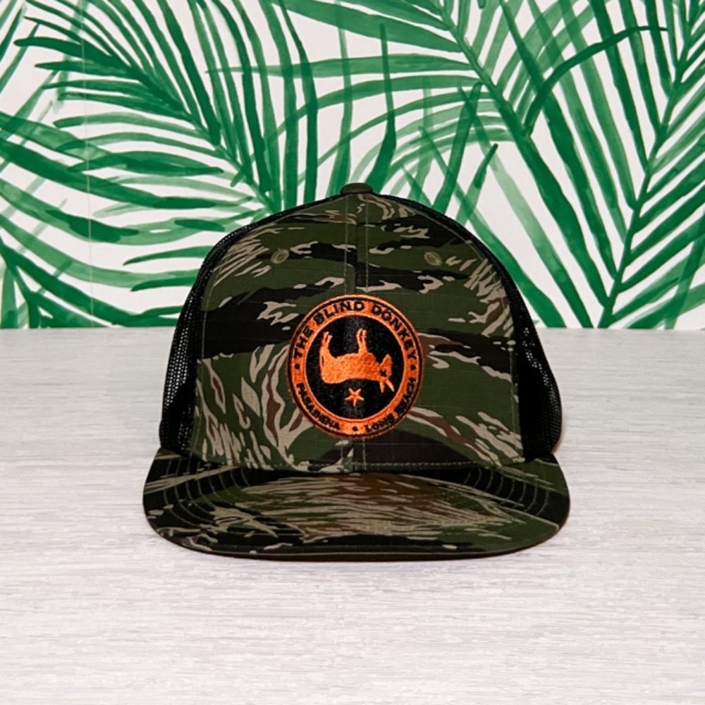 The Blind Donkey Camo Trucker Hat M/L